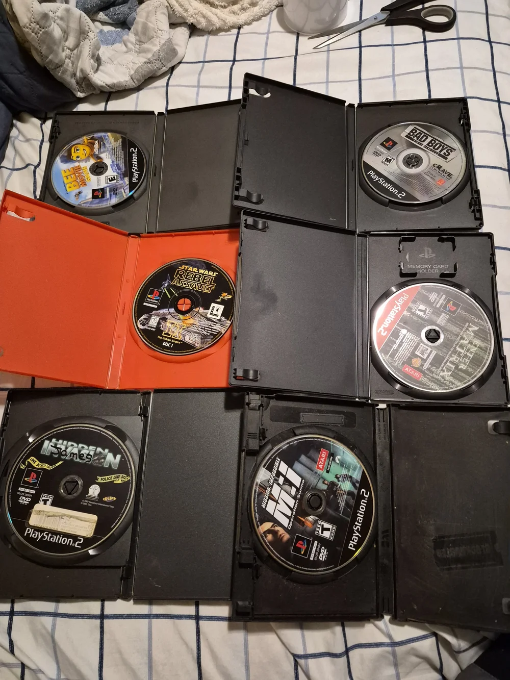 Sony PlayStation 2 Game Disc Bundle with Black and Red Cases. Lot Of 6